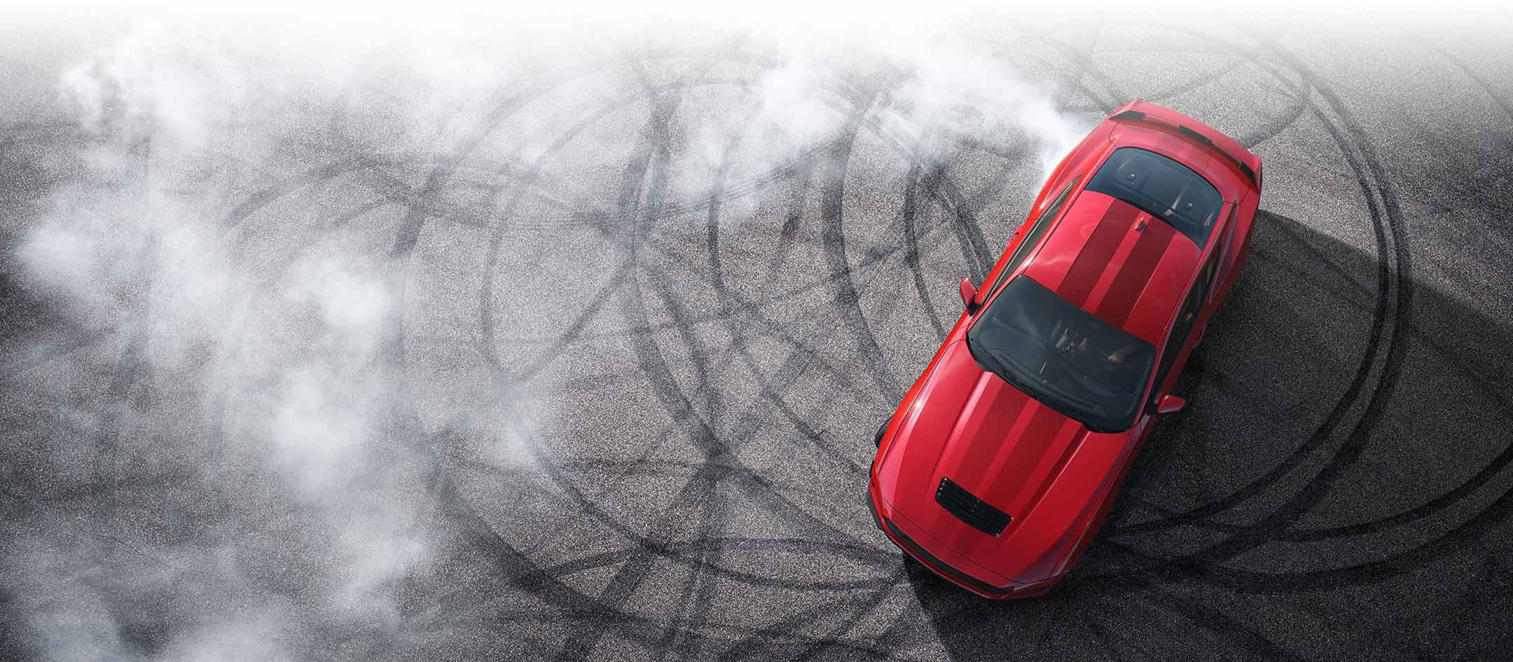 Overhead view of a 2024 Ford Mustang® model with tire tracks on pavement | Banister Ford of Marlow Heights in Suitland MD