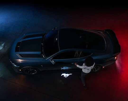 2024 Ford Mustang® Dark Horse™ model with a driver approaching the vehicle | Banister Ford of Marlow Heights in Suitland MD